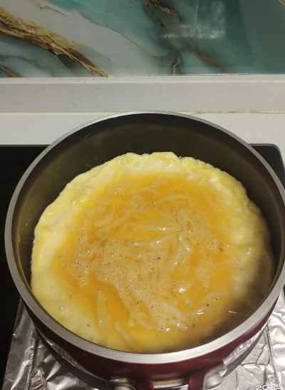 小さな銀色の魚を使ったオムレツの作り方：4