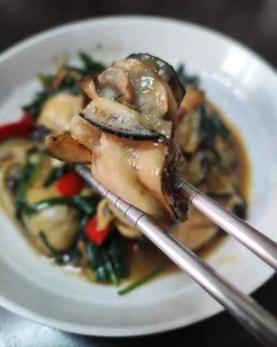 生姜とネギで炒めた牡蠣のレシピ