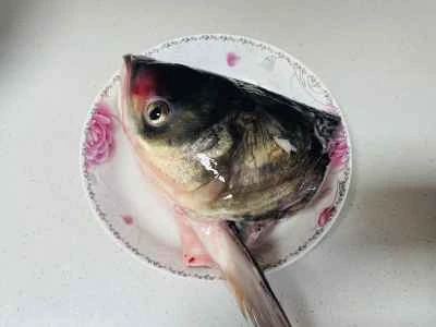 刻んだ唐辛子入り蒸し魚の頭の作り方:1