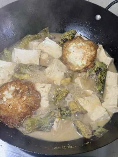 卵と豆腐入り黄ナマズの煮込みの作り方：12