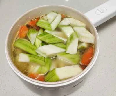 ヤムイモとニンジンの煮込みヘチマの作り方：5